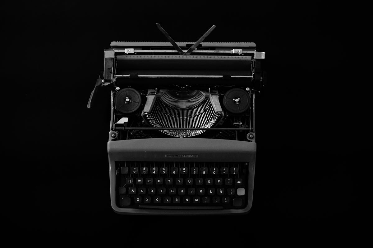 Vintage typewriter on a black background